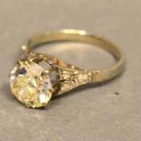 A Solitaire Diamond Ring Claw Set With Diamond Shoulders, approximately 2ct Hammer: £2,400