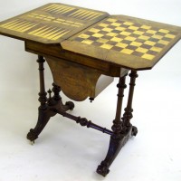 Victorian burr walnut and marquetry inlaid games/work table Hammer: £1,250