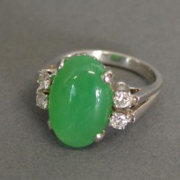 An 18 ct. White Gold, Jade and Diamond Ring Hammer £1800