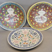 A Pair of Canton Dishes, each decorated in polychrome enamels with figures and script together with another similar Chinese charger  Hammer £720
